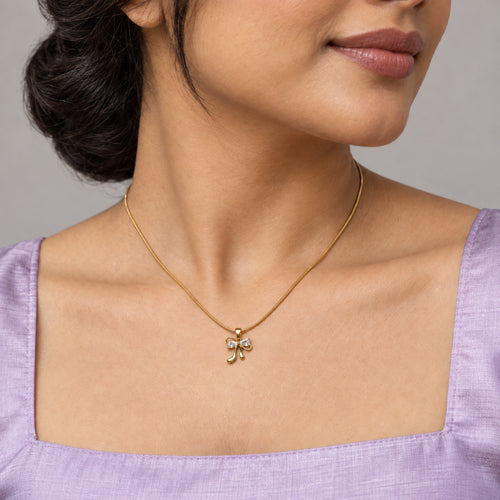 Crystal Bow Pendant Necklace worn by model