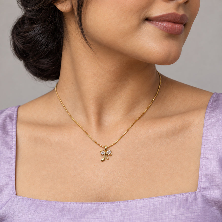 Crystal Bow Pendant Necklace worn by model