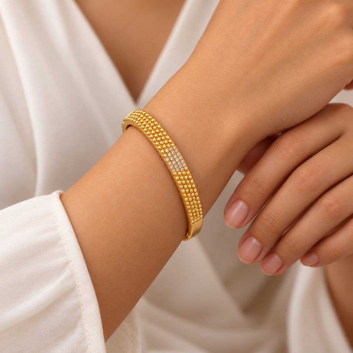 Golden Dotted Oval Crystal Bangle - Model