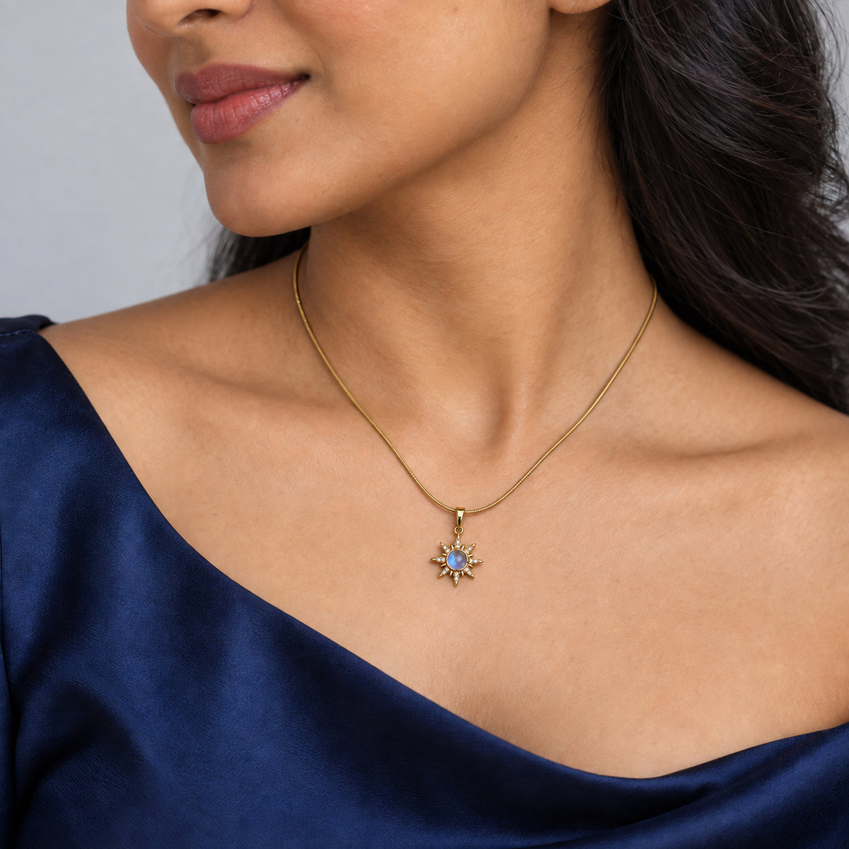 Iridescent Sunburst Pendant Necklace worn by model
