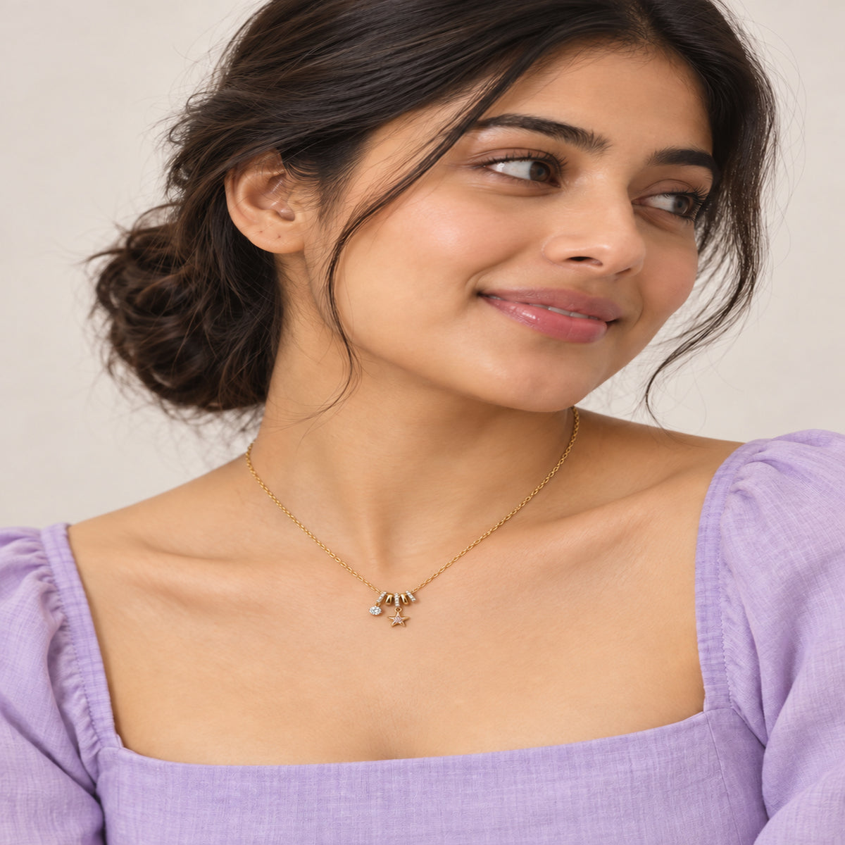 Pink Star Charm Necklace worn by model