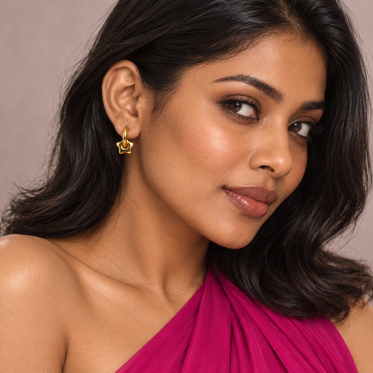 Sculpted Star Knot Earrings worn by model