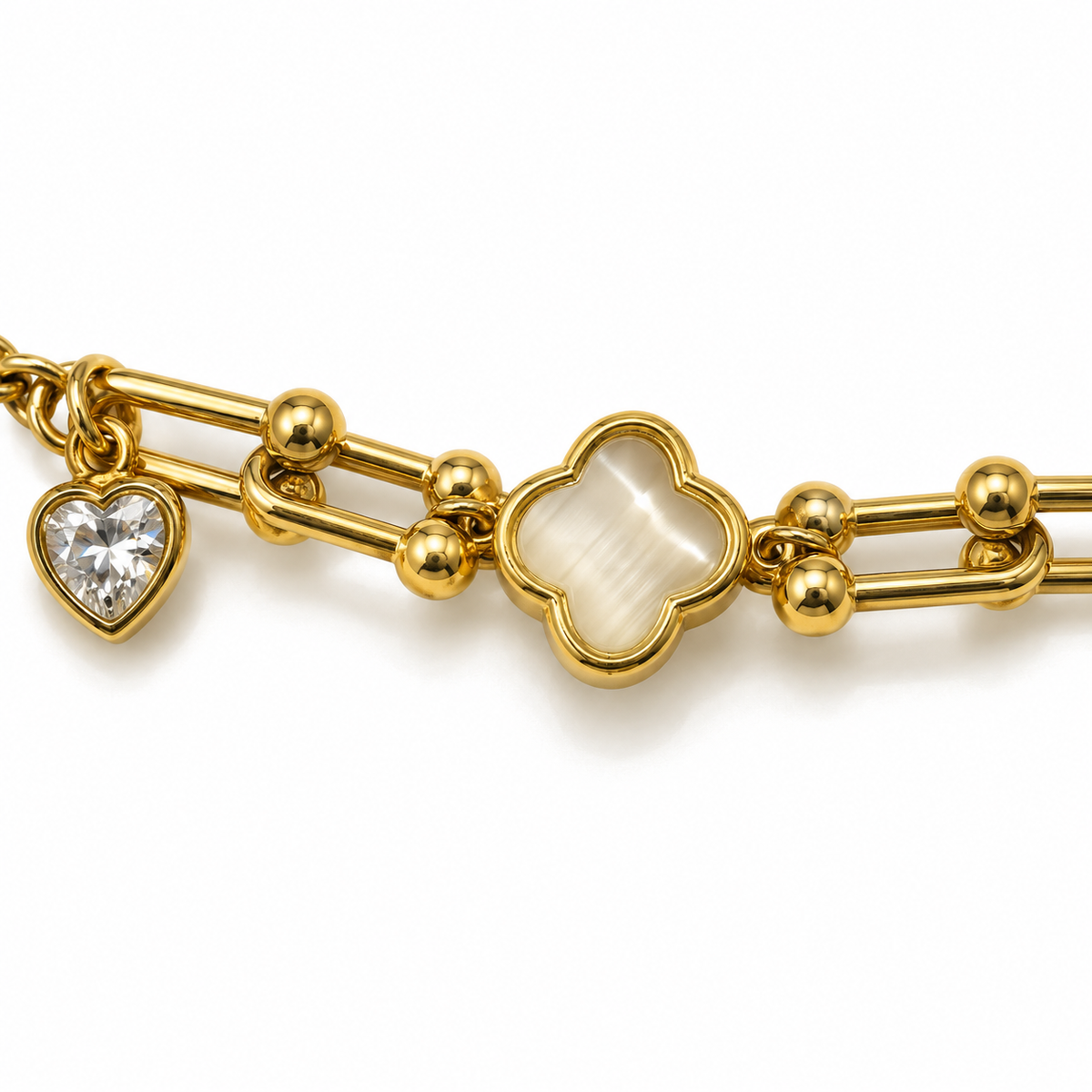 Elegant Gold Clover Bracelet with Heart Charm — detail photo